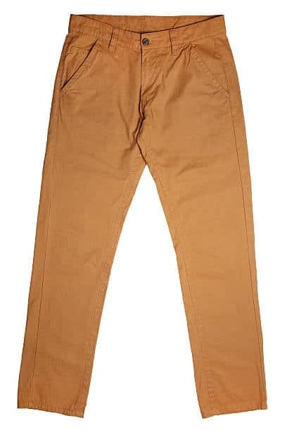 Pair of beige pants laid flat, illustrating a style that helps determine yards of fabric needed for sewing.